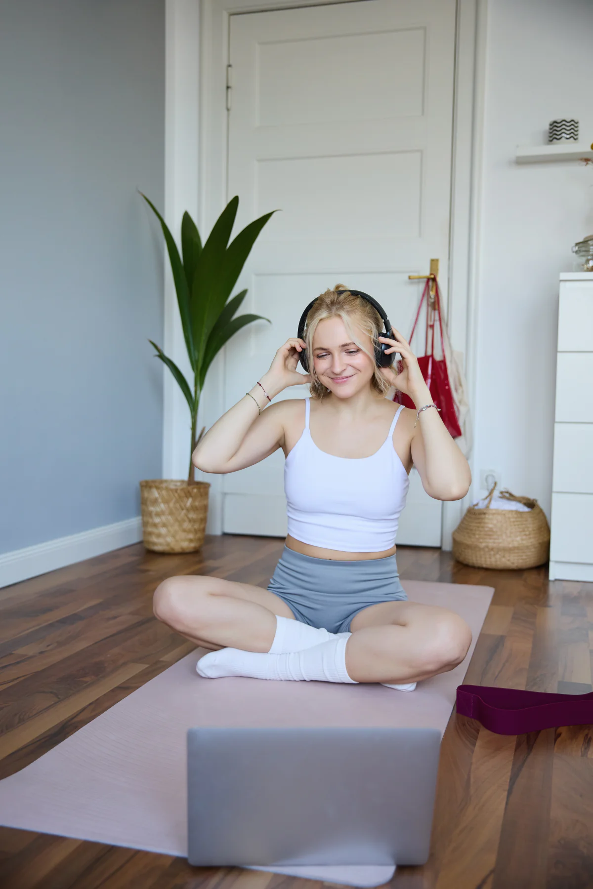 Client joining a training session from a mat at home over video